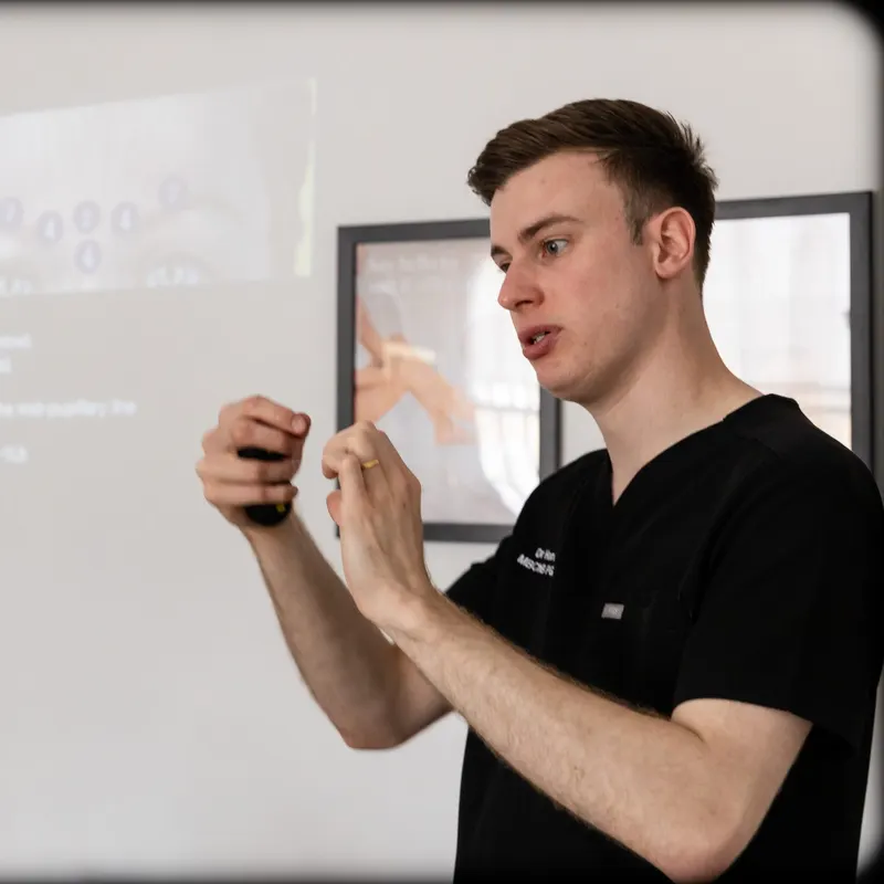 Dr Harry training aesthetic medicine in the clinic