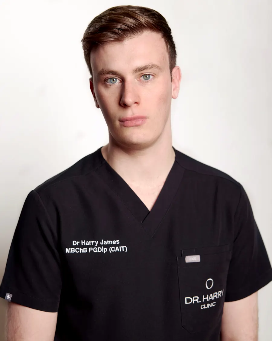 Studio portrait of Dr Harry James
