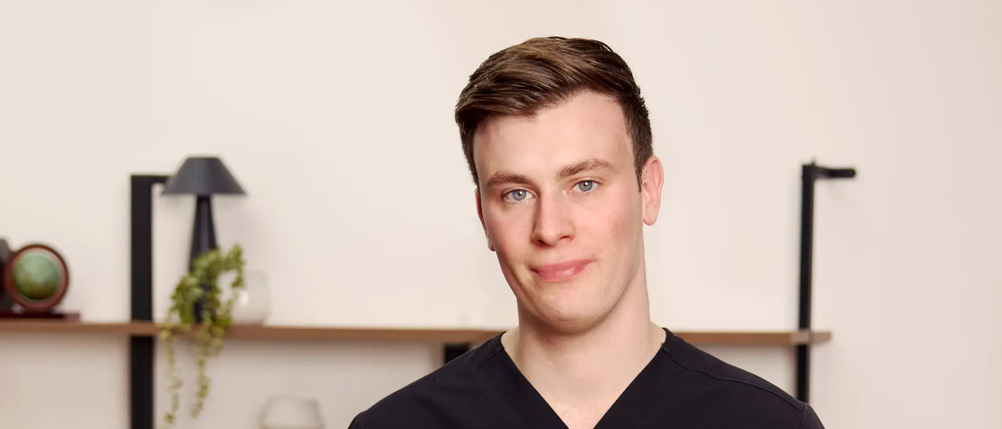 Dr Harry James in the consultation room at Dr Harry Clinic