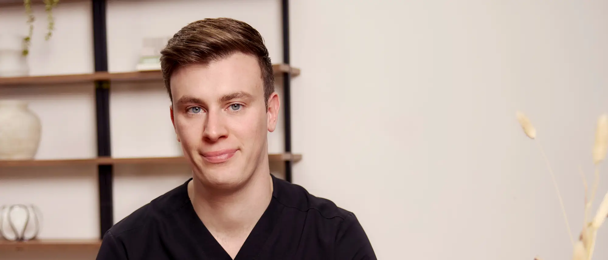 Dr Harry James in the consultation room at Dr Harry Clinic