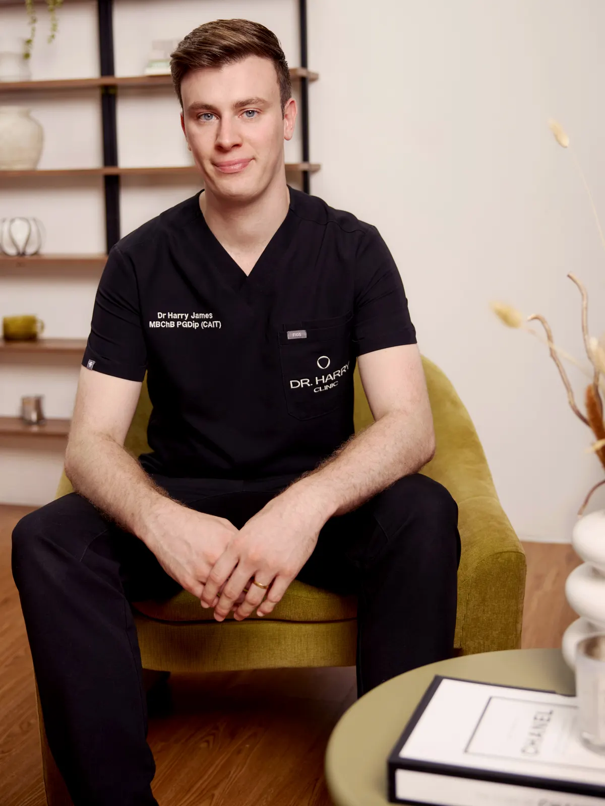 Dr Harry James seated in the consultation room